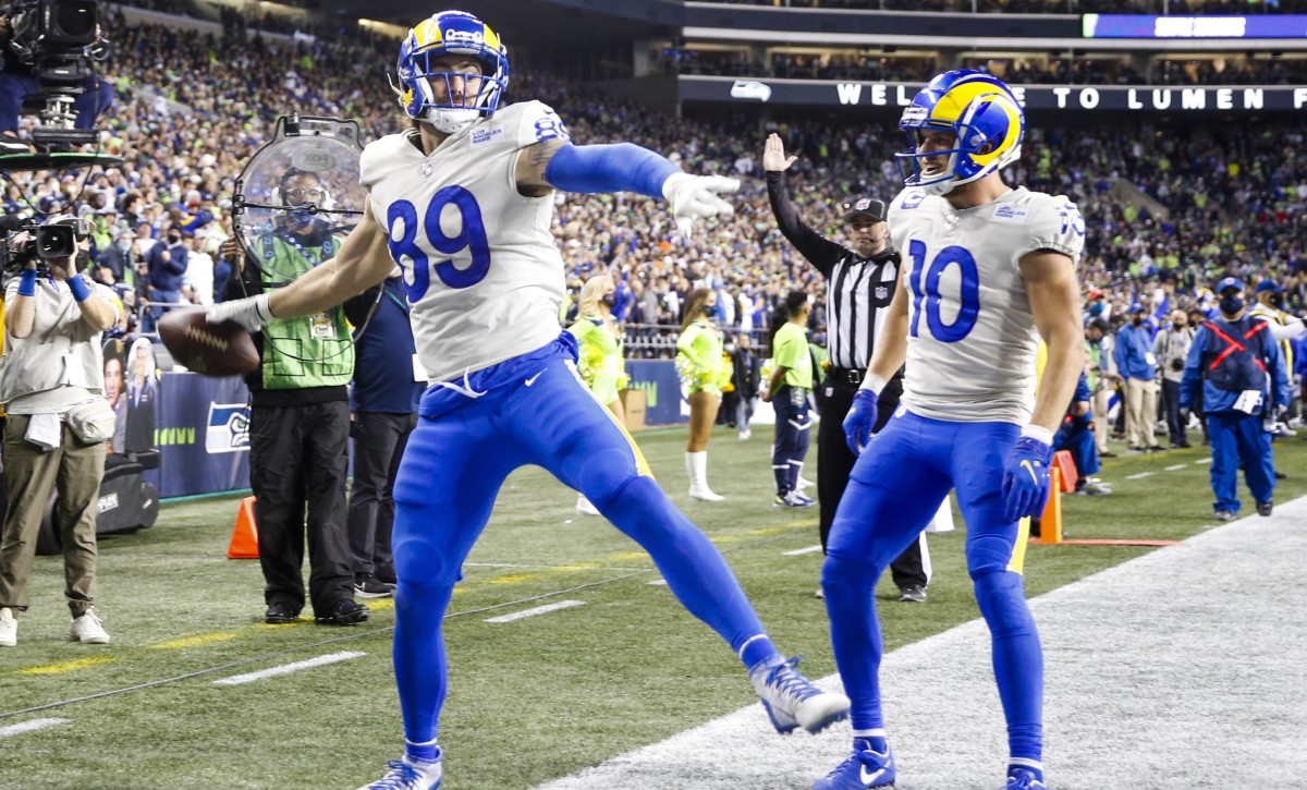 Los Angeles Rams tight end Tyler Higbee (89) celebrates with wide receiver Cooper Kupp (10) after catching a touchdown pass against the Seattle Seahawks during the third quarter at Lumen Field.